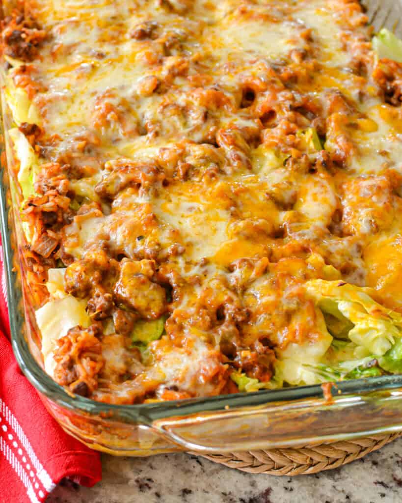 A 9x13 inch glass casserole dish full of cabbage roll casserole. 