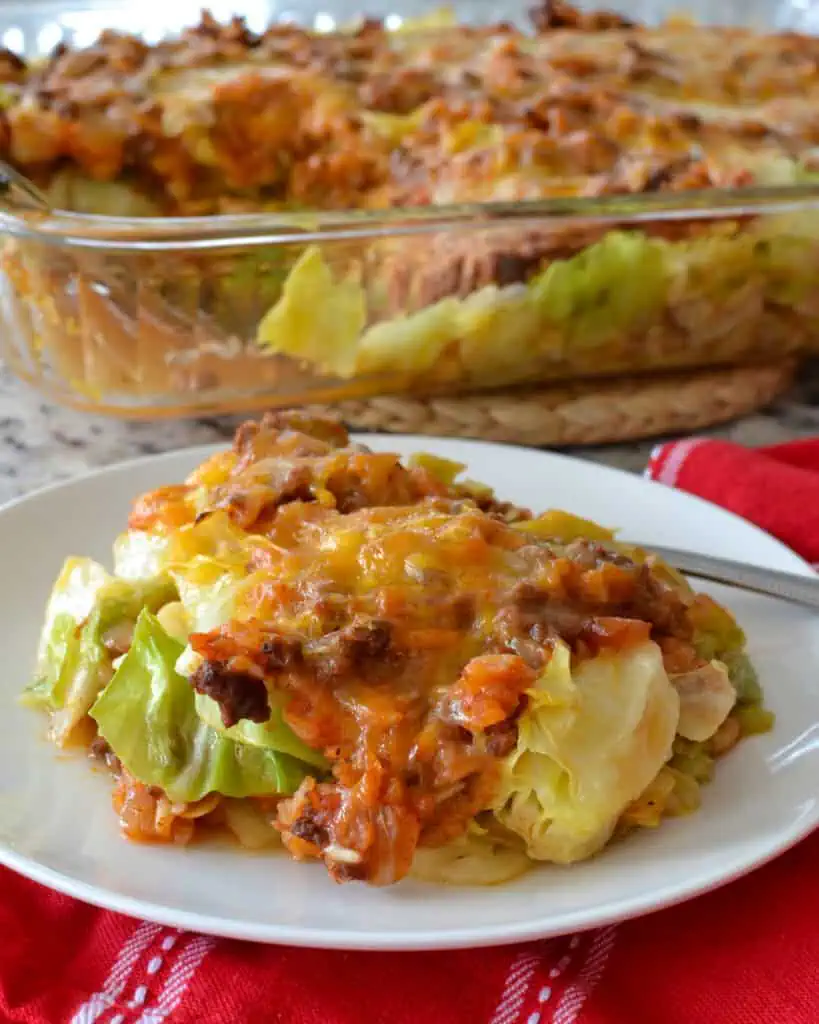 Cabbage roll casserole on a single serving plate with a fork. 