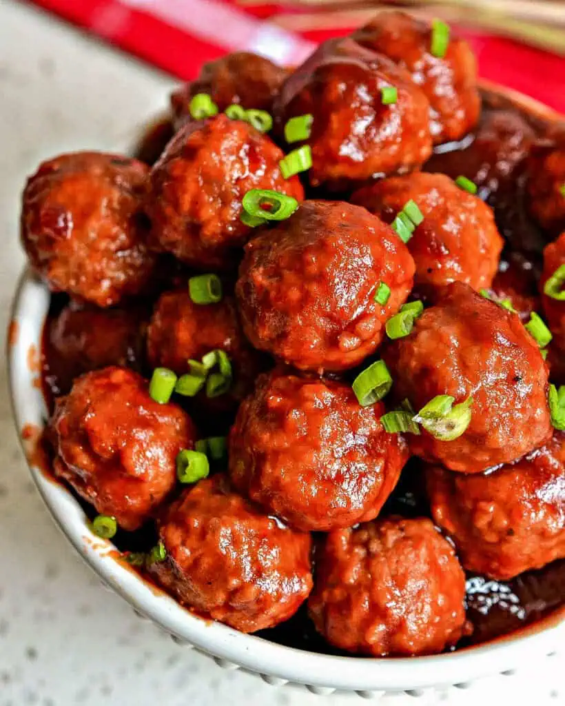 Over view image of cranberry meatballs in a bowl 