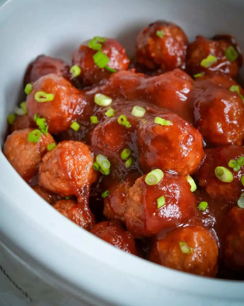 Cranberry meatballs in a crockpot. 