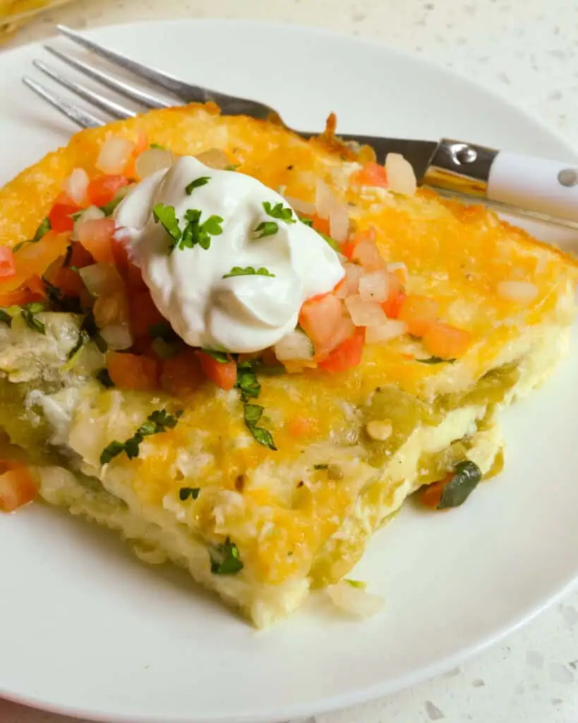 Egg and chile casserole piled high with pico de gallo and sour cream. 