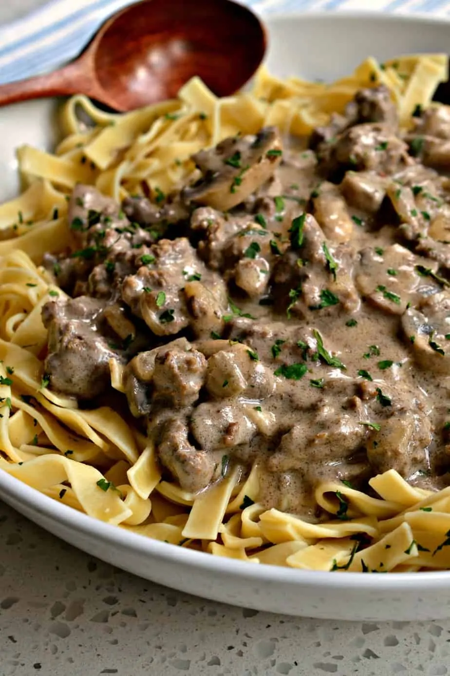 Ground Beef Stroganoff is made with mushrooms, onions, and garlic in a creamy rich gravy.