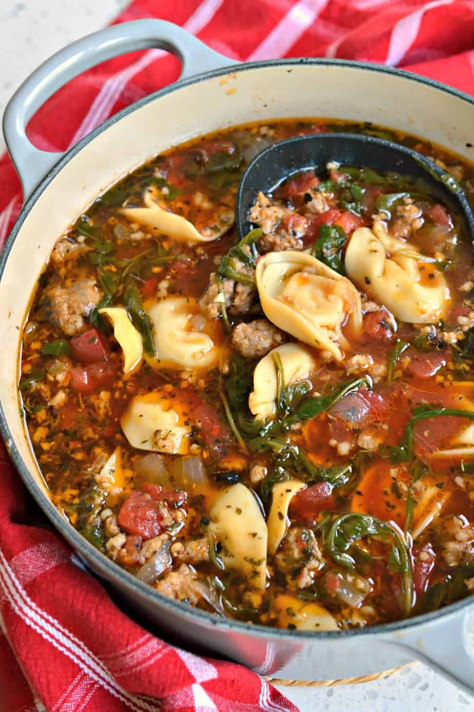 Tortellini Soup with Sweet Italian Sausage and Arugula