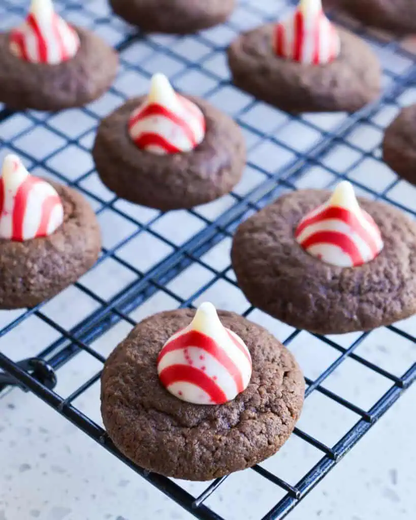 Chocolate Peppermint Thumbprints Cookies on a wire rack cooling