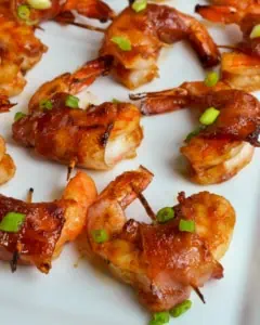 https://www.smalltownwoman.com/wp-content/uploads/2021/02/Bacon-Wrapped-Shrimp-4x5-1-240x300.webp