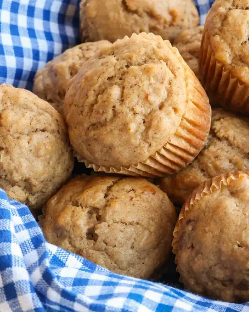 A basket full of applesauce muffins. 