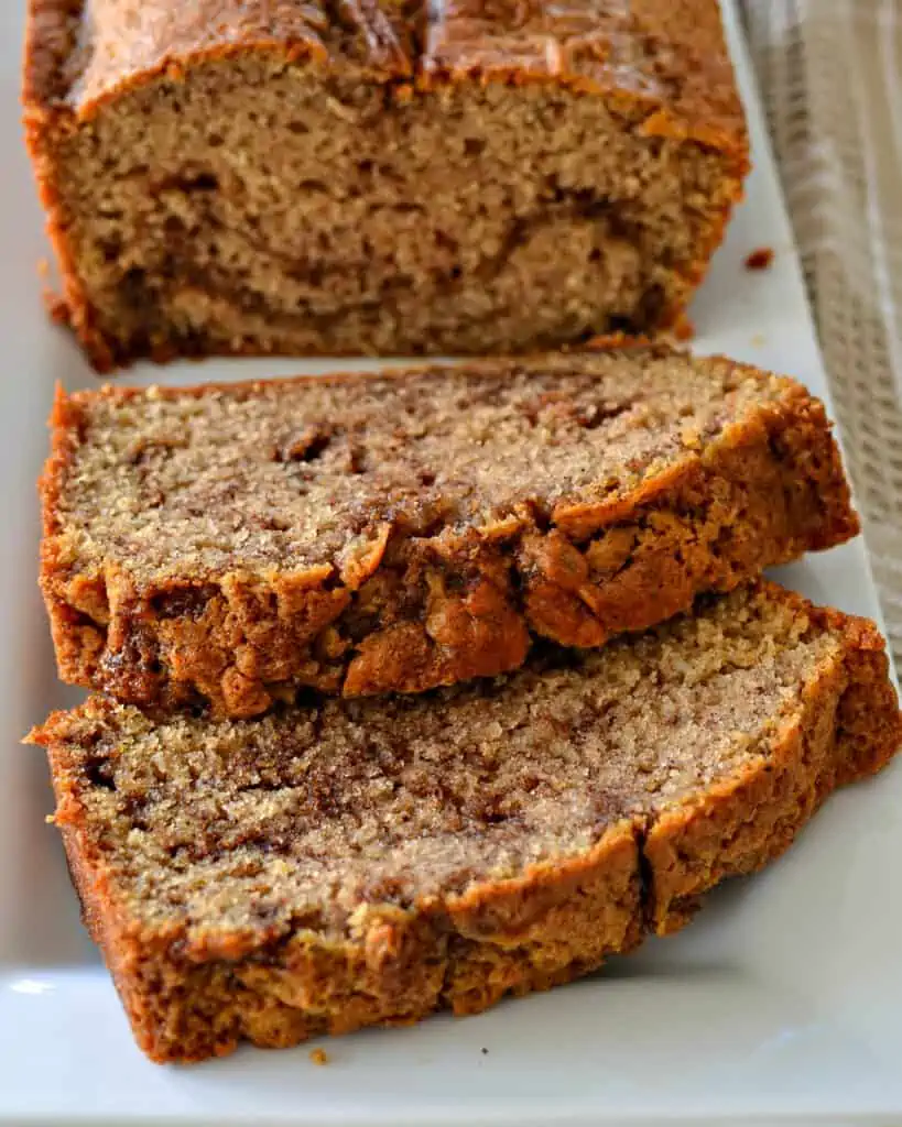 Cinnamon Swirl Bread is an easy quick bread recipe that comes together quickly and is swirled with sweet cinnamon butter making it perfect for breakfast or brunch.