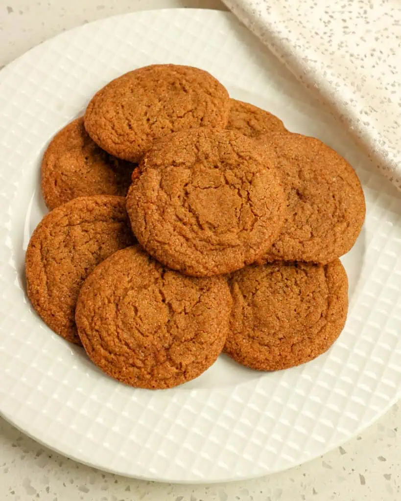 A serving plate full of gingersnap cookies. 