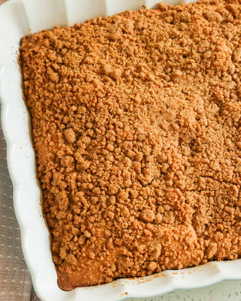 An overheadd view of freshly baked sour cream coffee cake. 