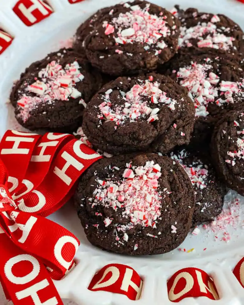 Chocolate Peppermint Cookies on a white Christmas platter. 