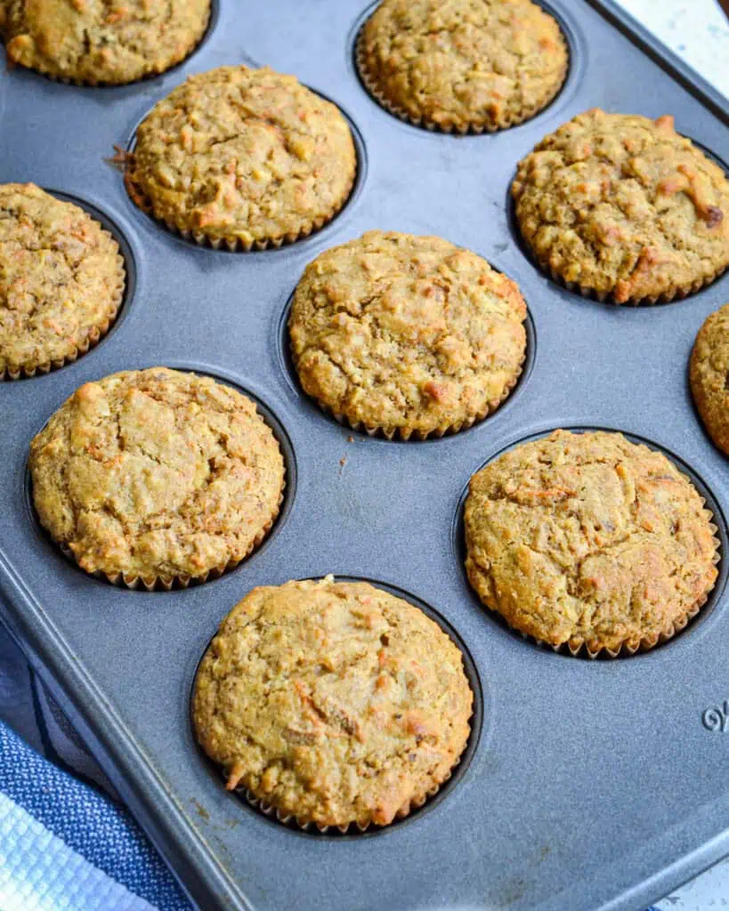 A tin full of fresh baked bran muffins. 