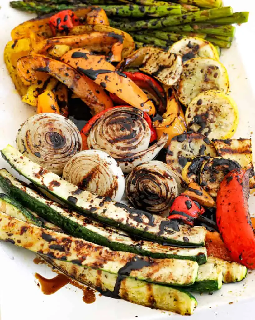Grilled Vegetables bring together peppers, zucchini, squash, onions and asparagus all topped with a balsamic reduction. 