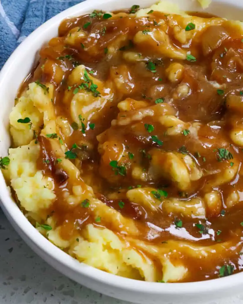 A deliciously easy Onion gravy made with slow cooked sweet caramelized onions, a touch of mustard, and fresh thyme. 