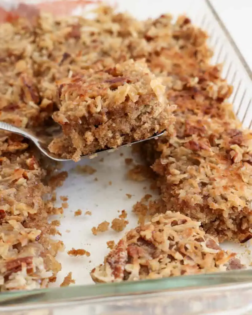 A pierce of oatmeal cake on a spatula.