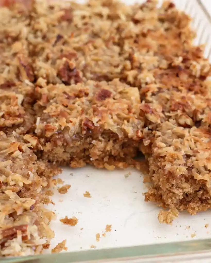 Slices of oatmeal cake in a glass pan. 