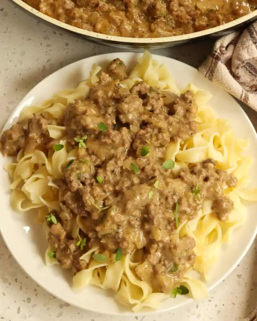 Hamburger gravy is delicious served over egg noodles.