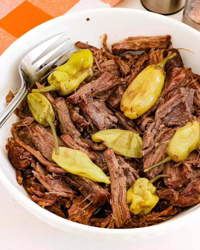 Mississippi pot roast and pepperoncini in a bowl. 