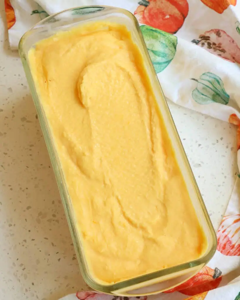 Orange sherbet in a loaf pan. 