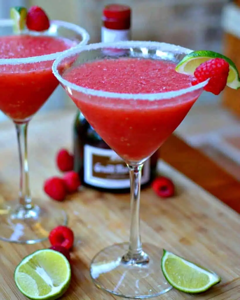 A mouthwatering good Raspberry Margarita made in under five minutes making it perfect for all your spring and summer events.