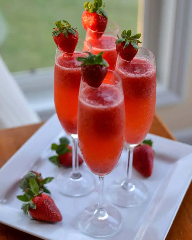 Strawberry mimosas in champagne flutes