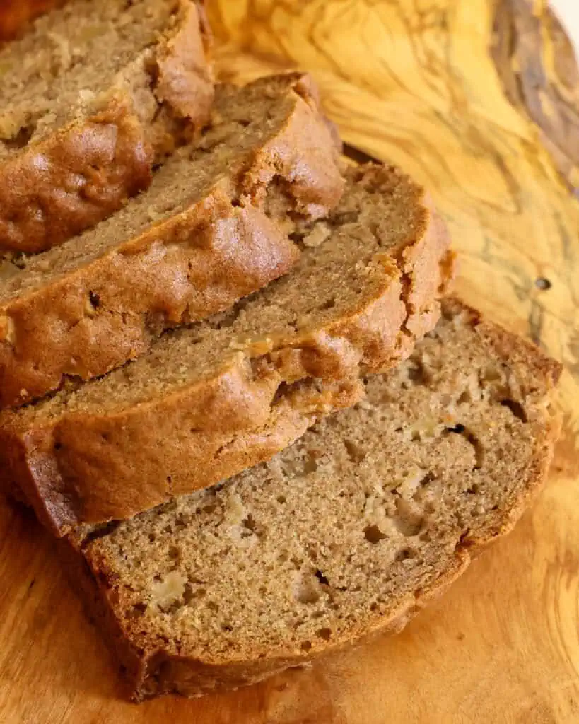 A close up view of three apple bread slices. 