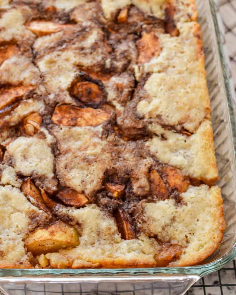 Homemade apple cobbler in a 9x13 inch glass baking dish. 