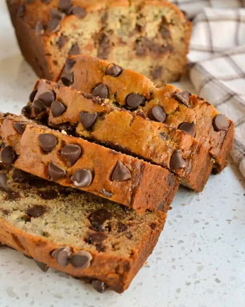 Four slices of chocolate chip banana bread. 