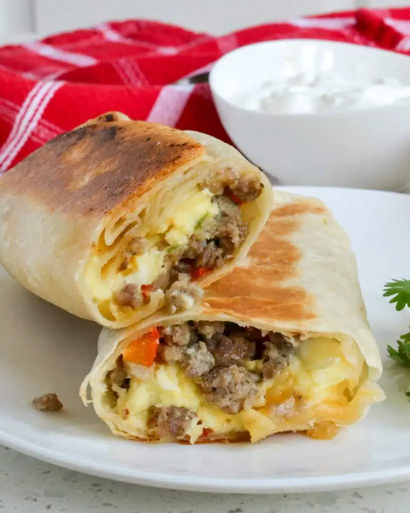 Breakfast burritos with eggs, sausage, and cheese. 