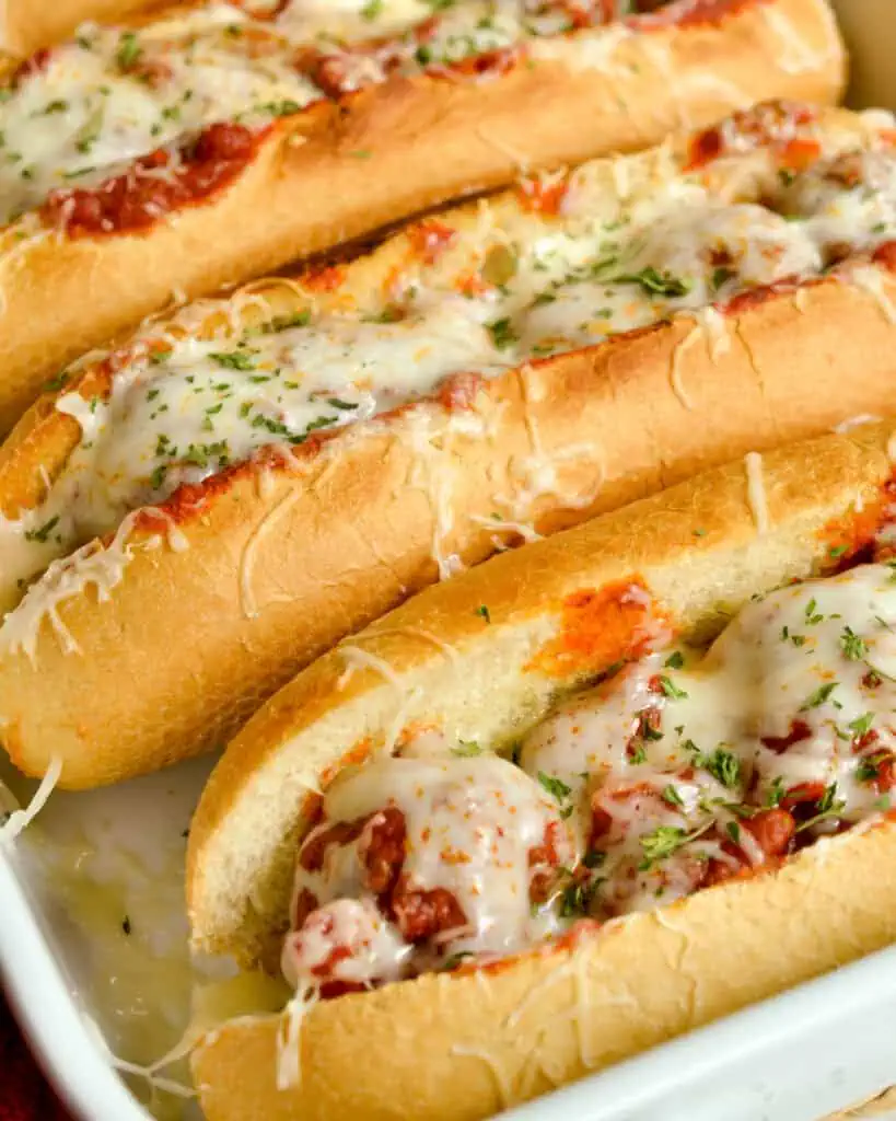 Meatball subs in a casserole dish. 