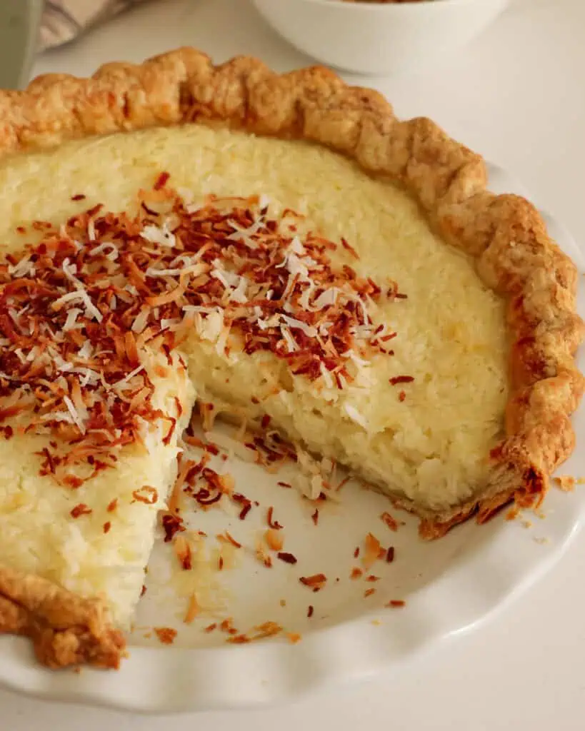 A close up view of coconut custard pie. 