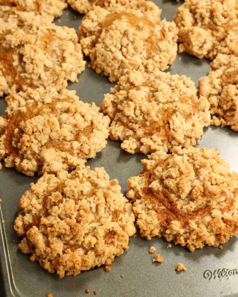 Fresh baked pumkin muffins in a tin. 