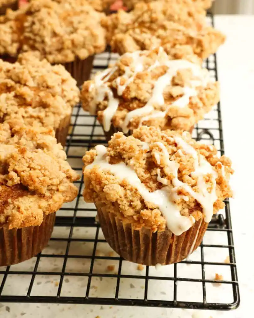 Moist pumpkin muffins with a streusel topping and cinnamon maple drizzle. 