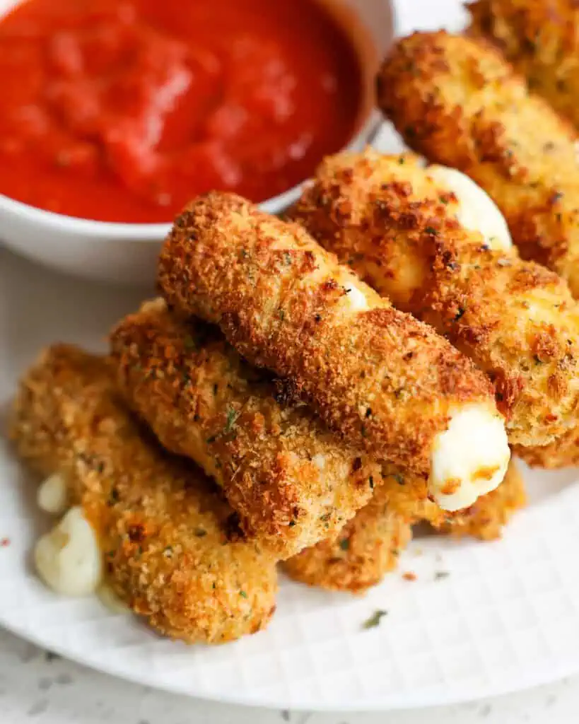 Fresh homemade mozzarella sticks made in the air fryer. 