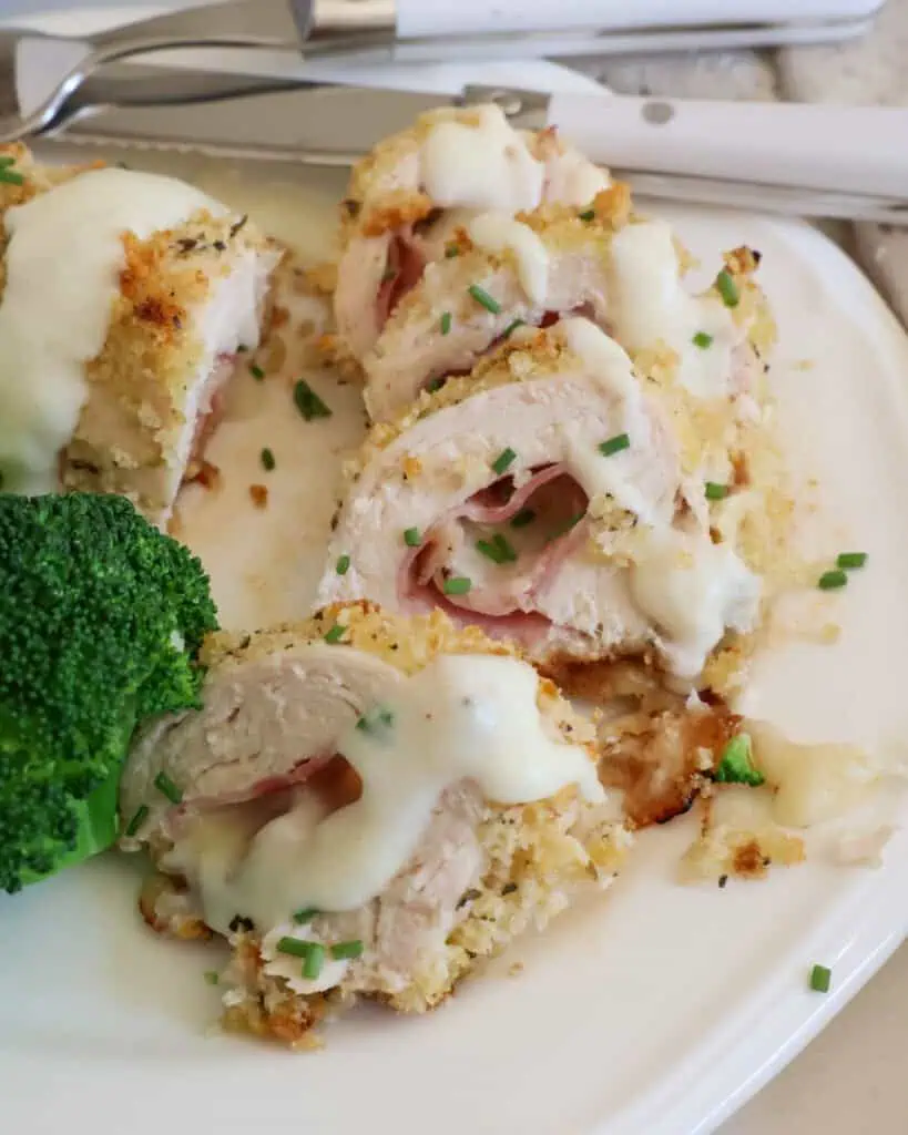 A close up view of classic chicken cordon bleu on a plate