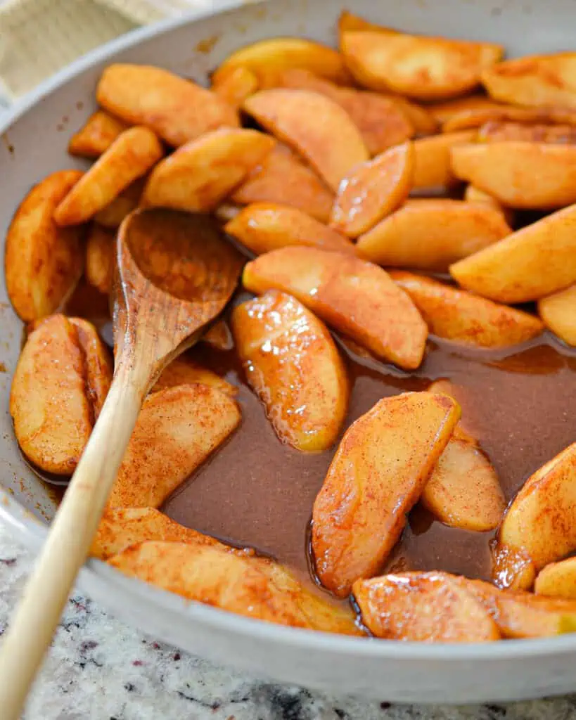 Fried apples wth butter, sugar, and cinnamon. 