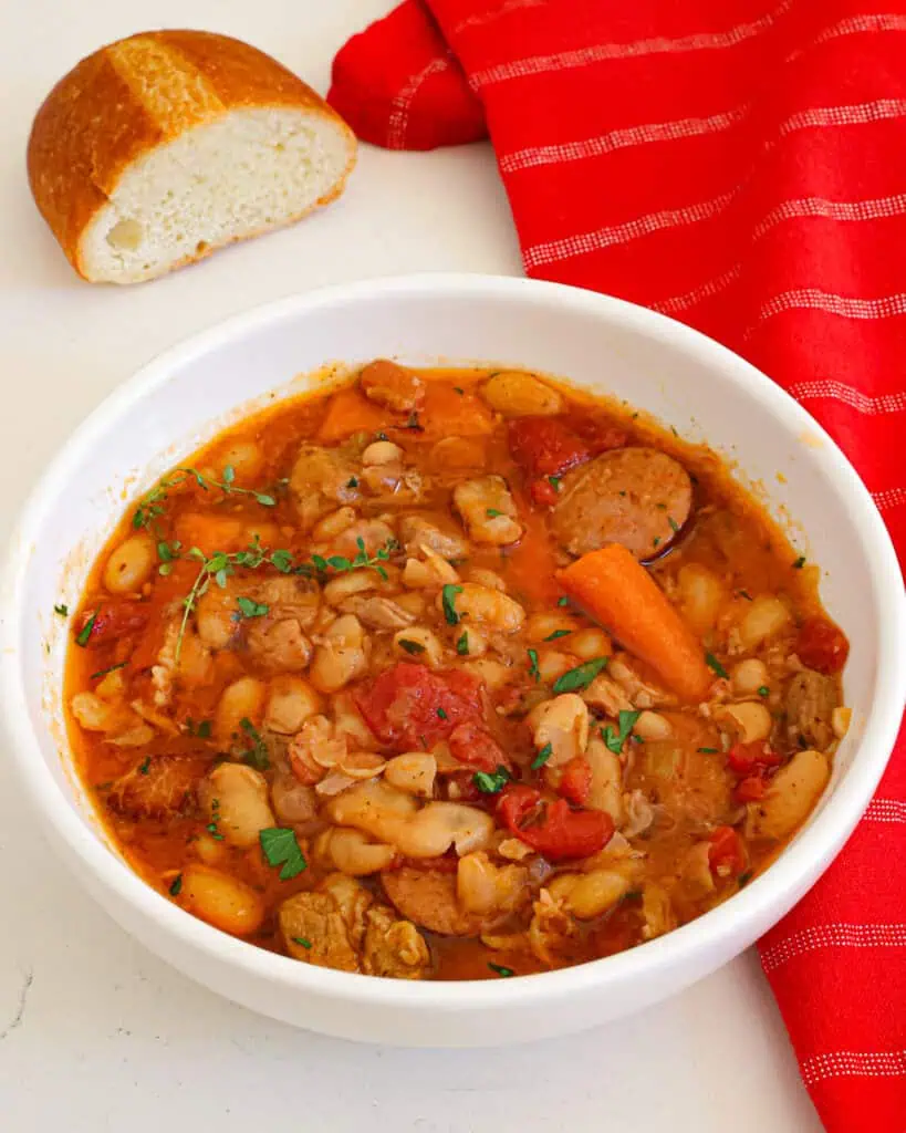 A bowl full of French cassoulet. 