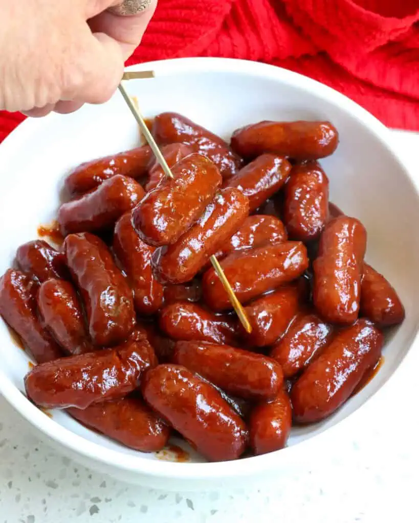 This little Smokies Recipe with little smoked sausages in a slightly spicy barbecue glaze are easily made in a skillet on the stovetop. 