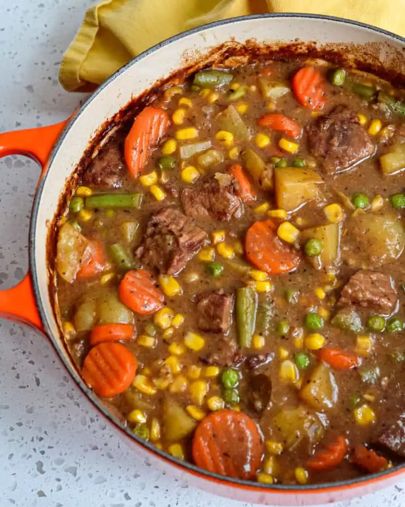 A Dutch oven full of Mulligan stew. 