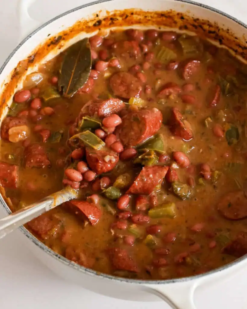 These Louisiana-style red Beans and Rice combine red beans, andouille sausage, the holy trinity of Louisiana cooking, and a perfect blend of Cajun spices.